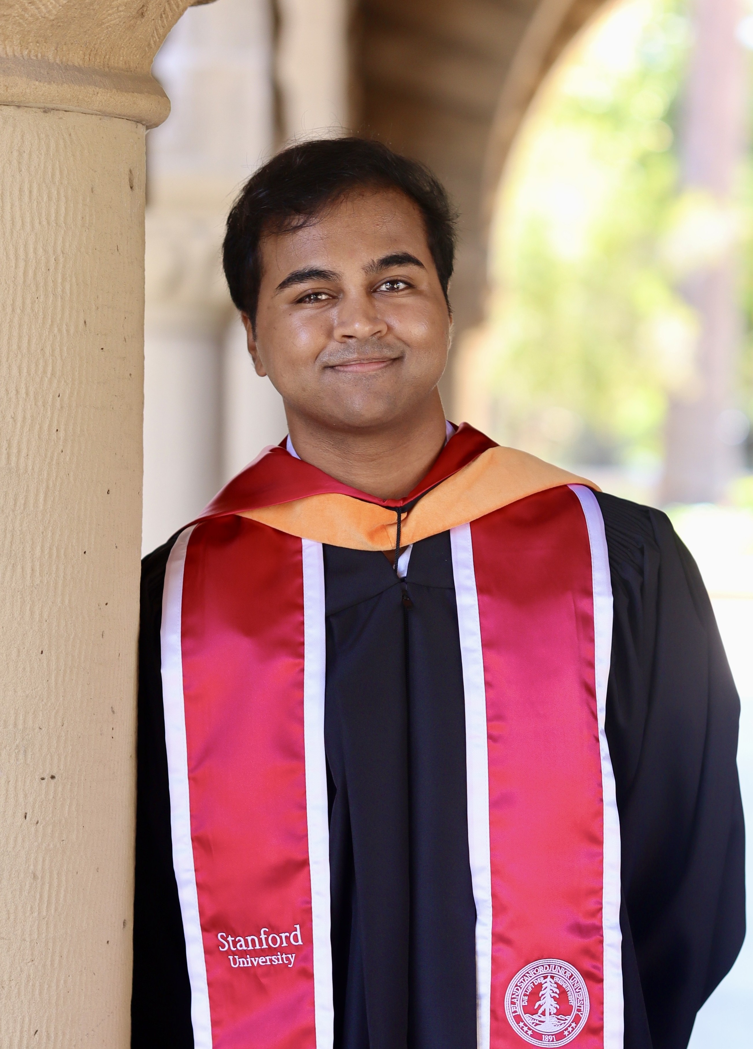 Picture of me in my Stanford Master's gown at graduation